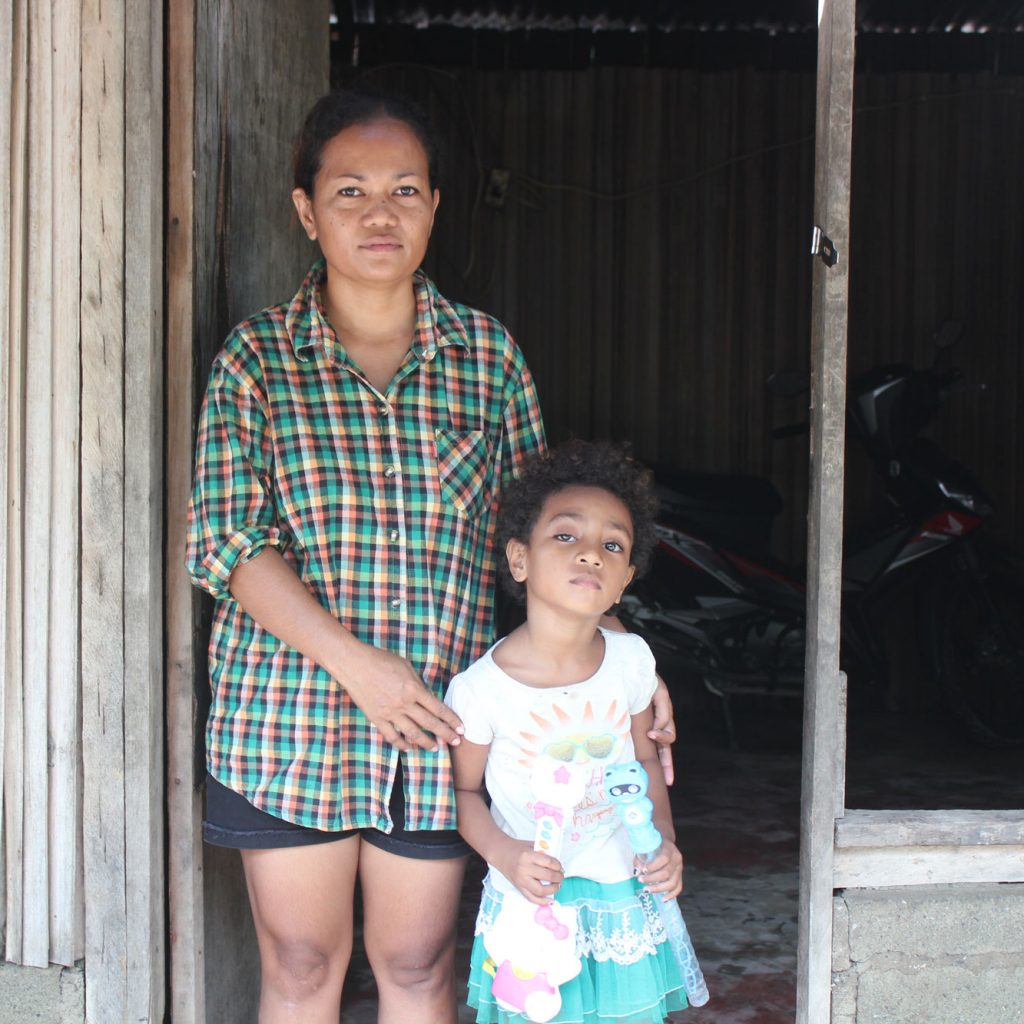 ChildFund Timor-Leste field staff Madalena and daughter Anisa, age 5.